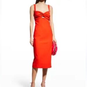 Beautiful orange dress with cross ties at the breast. Worn once.